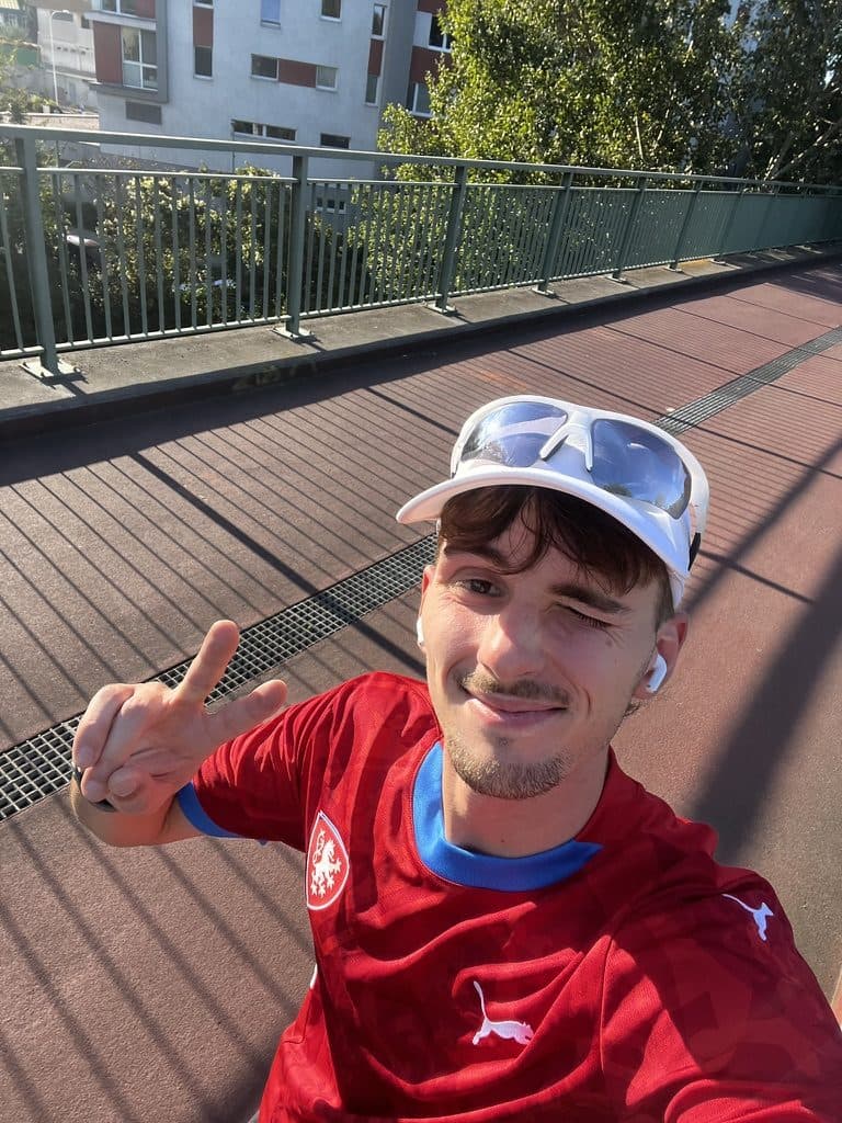 Quentin in a Czech football jersey, out for a run