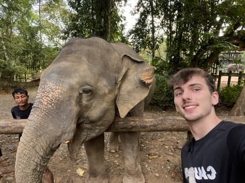 Quentin taking a selfie with an elephant